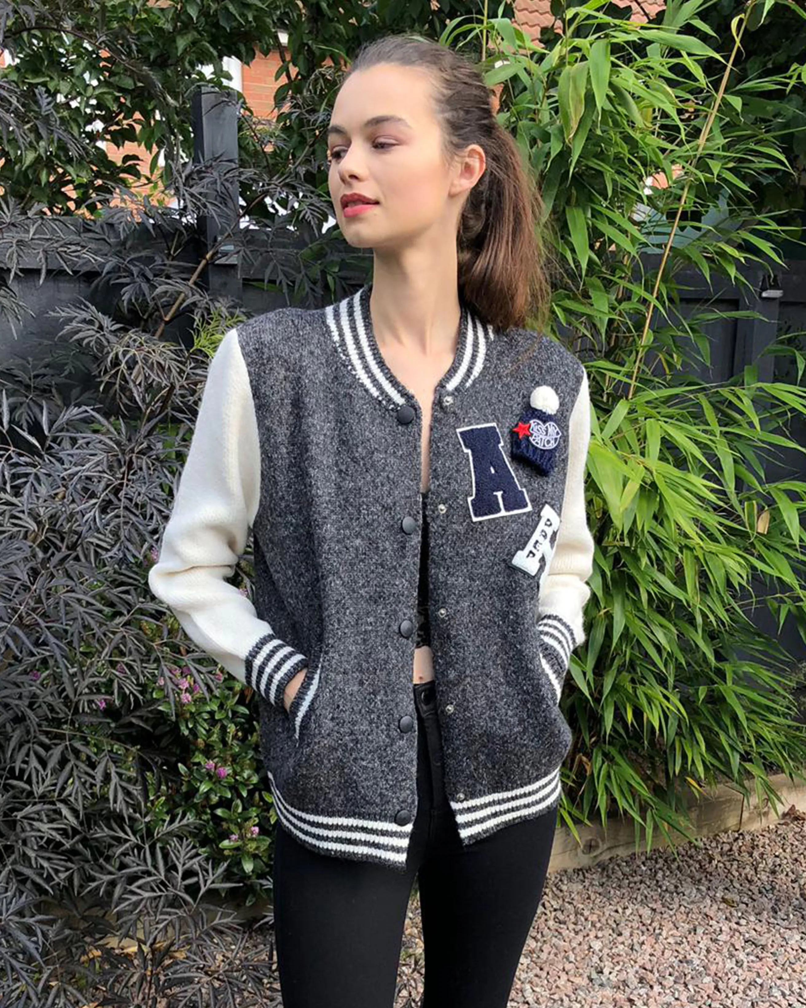 Knitted cardigan style bomber jacket with patch